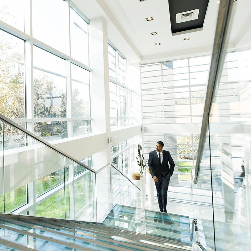 An interior stairway in a modern commercial building